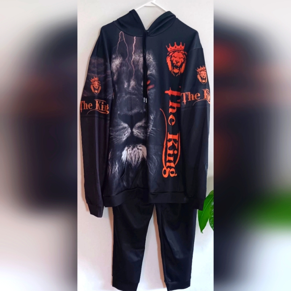 Stylish Black Hoodie with Orange Lion Design XXL